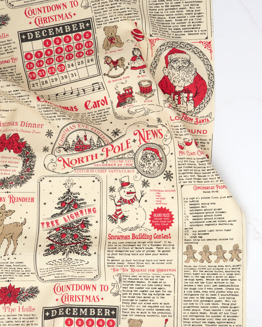 North Pole News in Midnight - Holiday Cheer by Stacy Iest Hsu - Half Yard Fabric (Preorder)