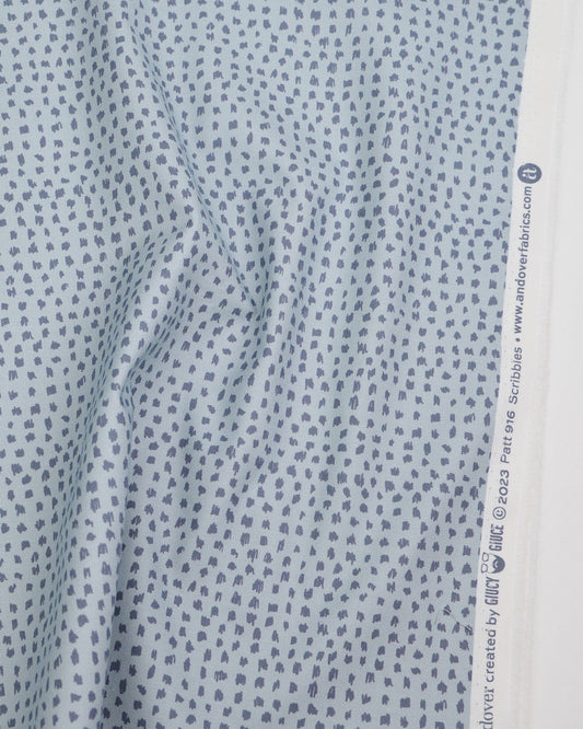 Cotton quilting fabric pattern called 'Scribbles in Moon'. Part of the 'Ink by Giucy Giuce' fabric collection. Designed by Giucy Giuce for fabric company Andover Fabrics. SKU: A-916-CL. 44-45 inch width.