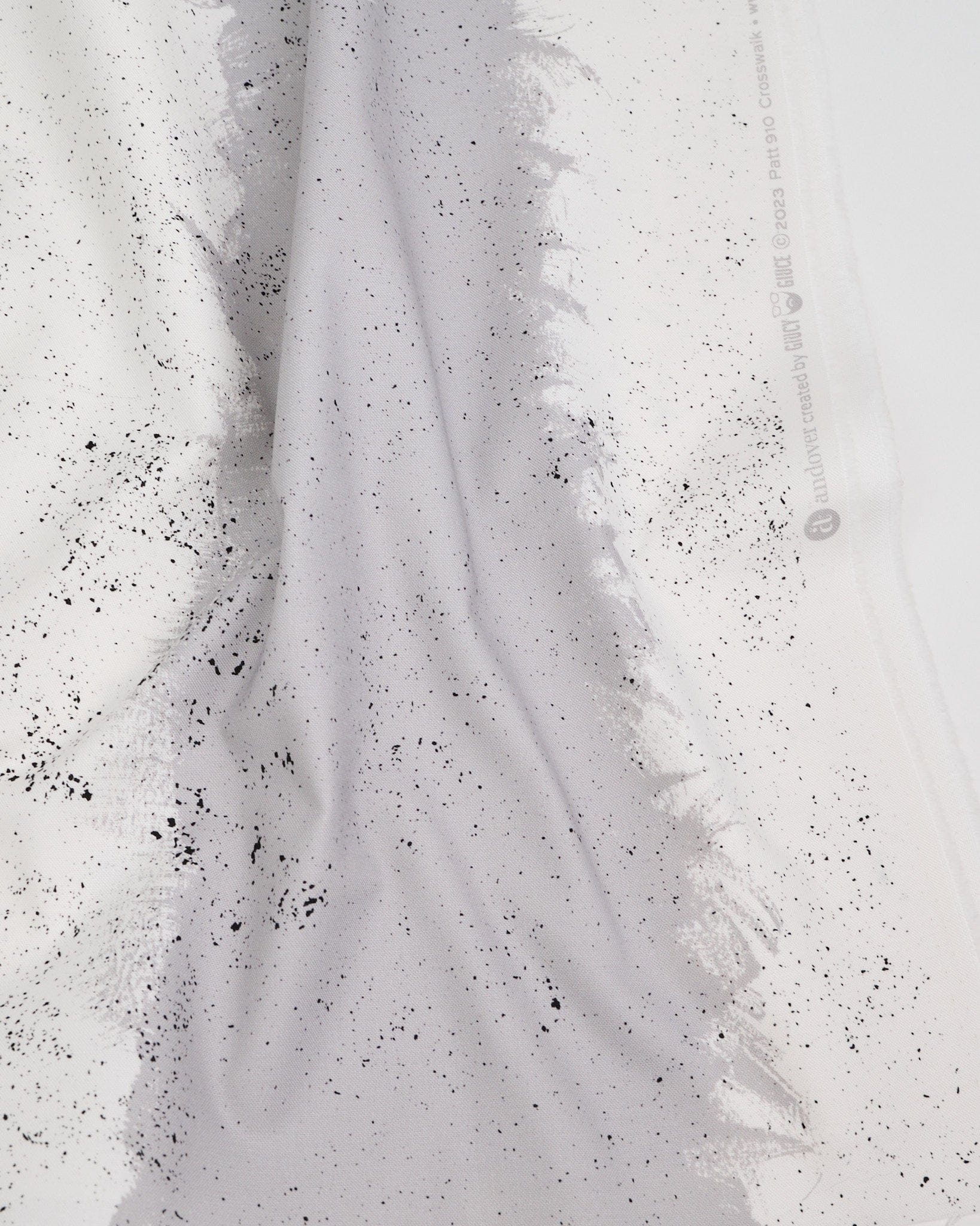 Cotton quilting fabric pattern called 'Crosswalk in Gray Agate'. Part of the 'Ink by Giucy Giuce' fabric collection. Designed by Giucy Giuce for fabric company Andover Fabrics. SKU: A-910-CL. 44-45 inch width.