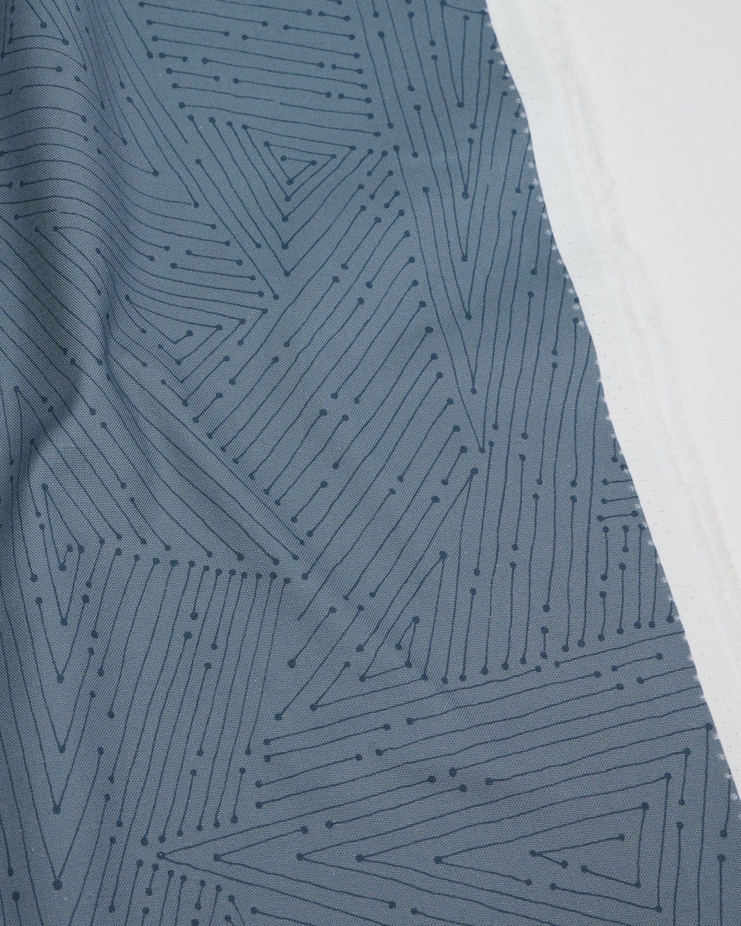 Cotton quilting fabric pattern called 'Connect in Storm'. Part of the 'Ink by Giucy Giuce' fabric collection. Designed by Giucy Giuce for fabric company Andover Fabrics. SKU: A-912-C. 44-45 inch width.