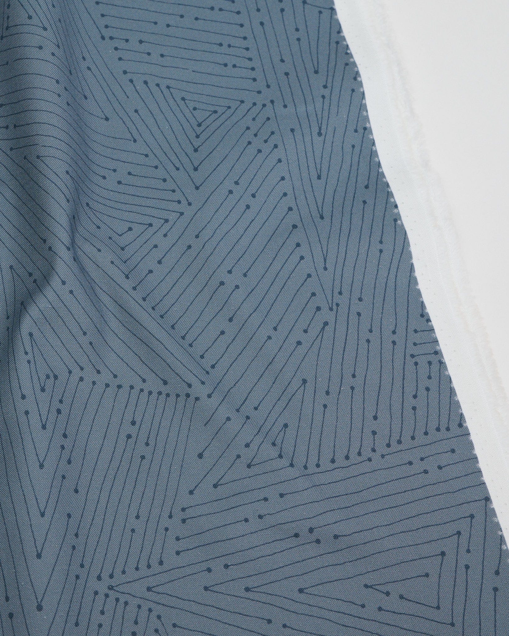 Cotton quilting fabric pattern called 'Connect in Storm'. Part of the 'Ink by Giucy Giuce' fabric collection. Designed by Giucy Giuce for fabric company Andover Fabrics. SKU: A-912-C. 44-45 inch width.