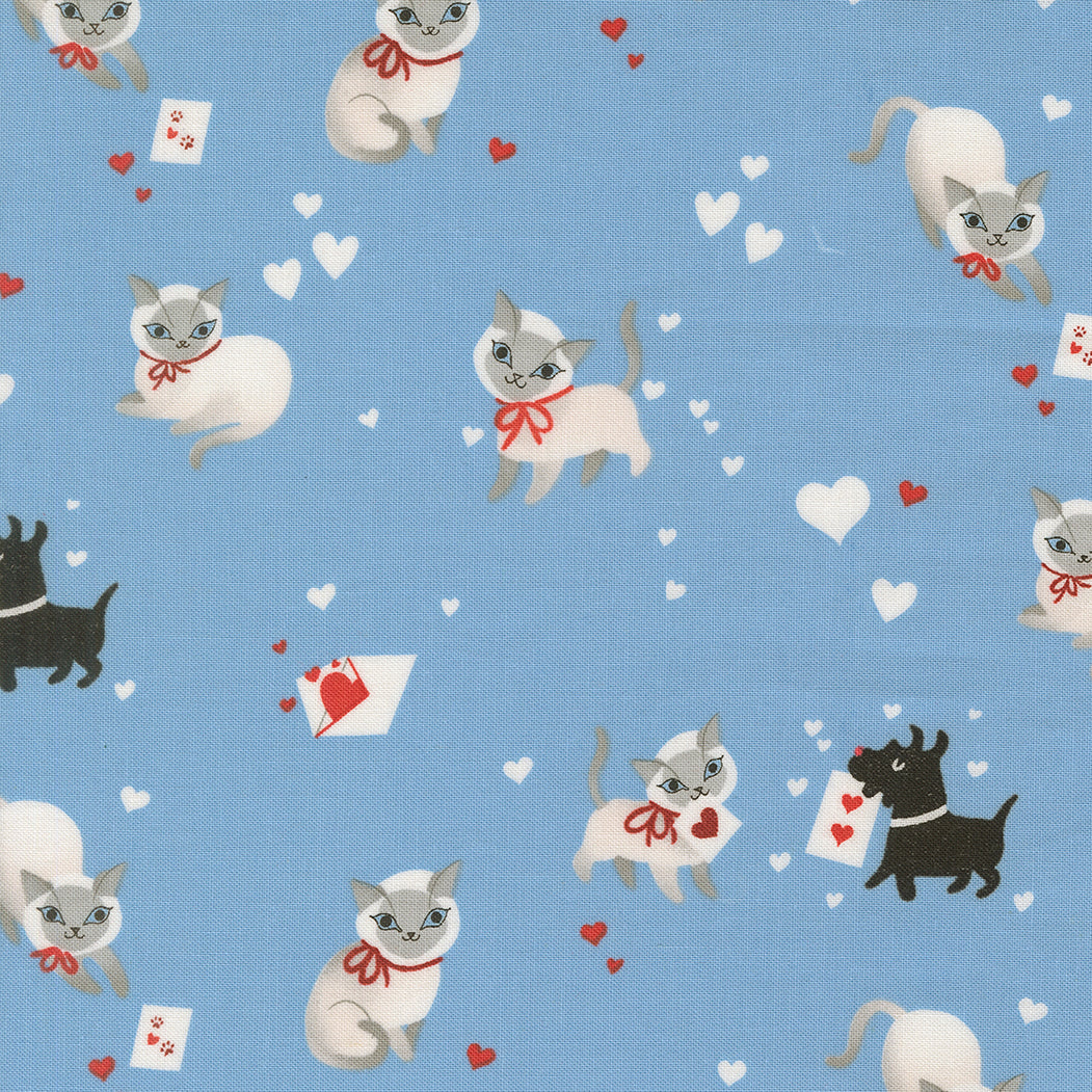 A closeup shot of the quilting fabric pattern called Kitty, designed by Lizzy House, in the sky colorway. The SKU is 37140 25.