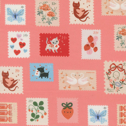 A closeup shot of the quilting fabric pattern called Stamps, designed by Lizzy House, in the coral colorway. The SKU is 37143 14.