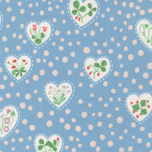 A closeup shot of the quilting fabric pattern called Flower Heart, designed by Lizzy House, in the sky colorway. The SKU is 37144 25.
