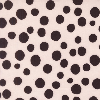 A closeup shot of the quilting fabric pattern called Big Dot, designed by Lizzy House, in the champagne colorway. The SKU is 37145 12.