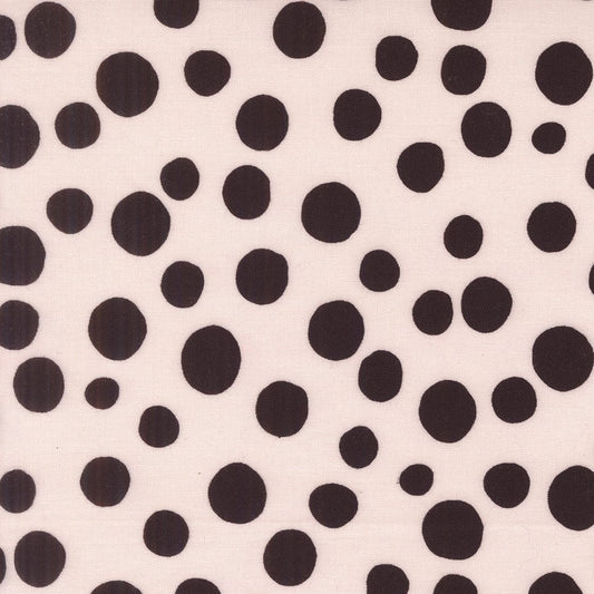 A closeup shot of the quilting fabric pattern called Big Dot, designed by Lizzy House, in the champagne colorway. The SKU is 37145 12.