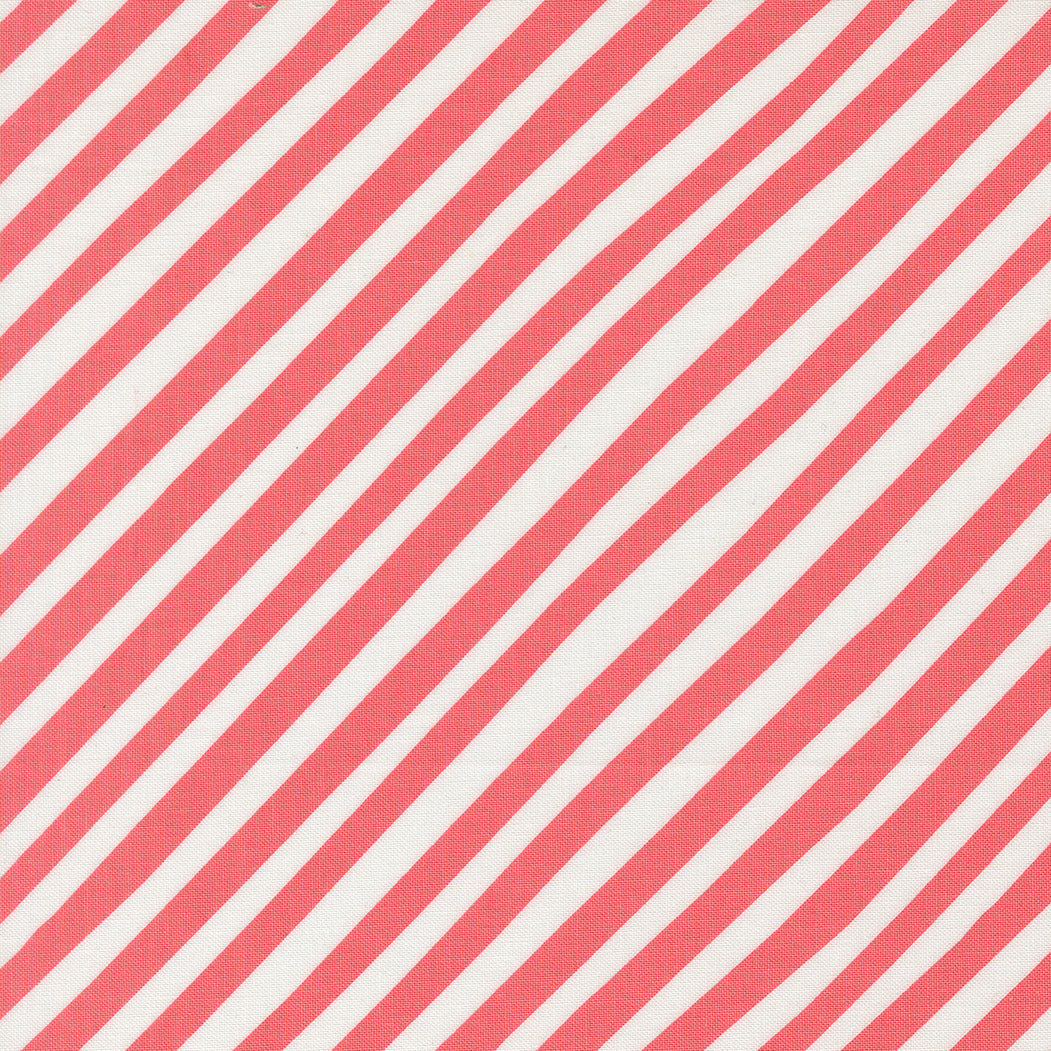 A closeup shot of the quilting fabric pattern called Stripes, designed by Lizzy House, in the coral colorway. The SKU is 37146 11.