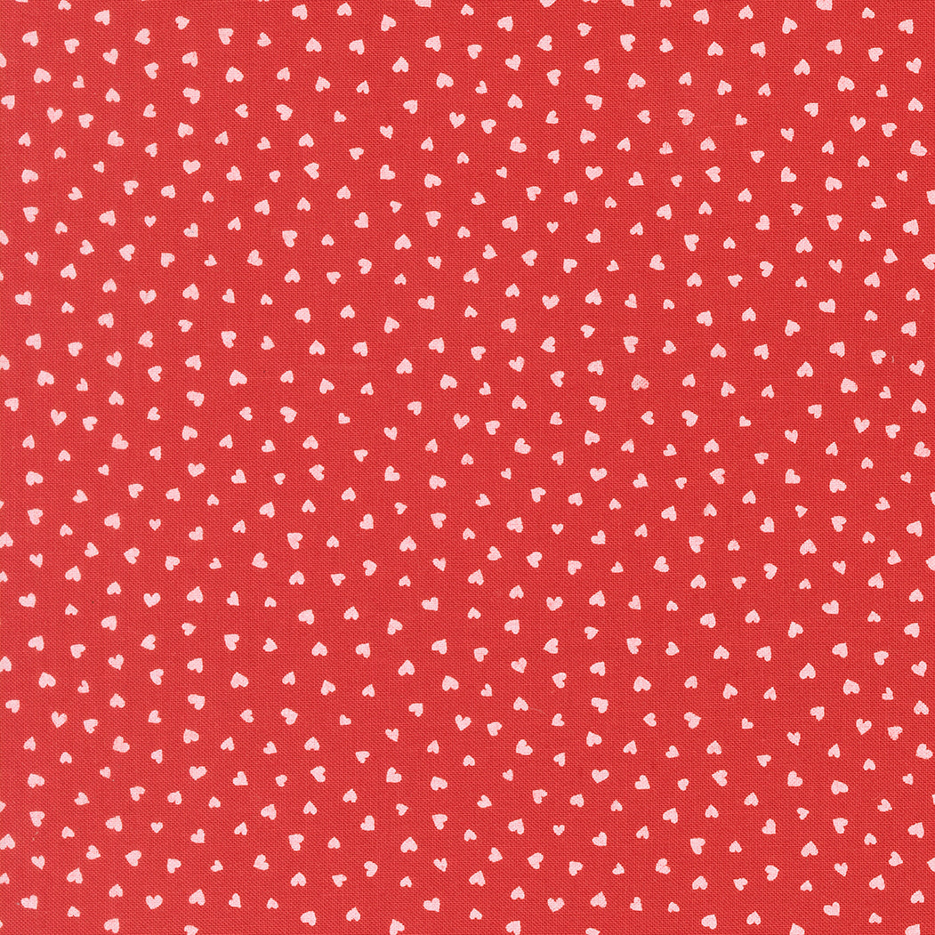 A closeup shot of the quilting fabric pattern called Tiny Hearts, designed by Lizzy House, in the love colorway. The SKU is 37148 16.