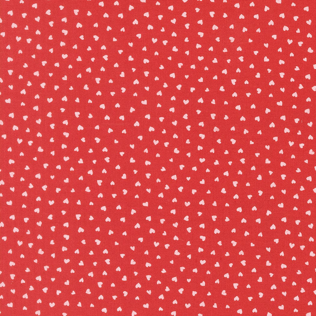 A closeup shot of the quilting fabric pattern called Tiny Hearts, designed by Lizzy House, in the love colorway. The SKU is 37148 16.