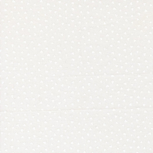 A closeup shot of the quilting fabric pattern called Tiny Hearts, designed by Lizzy House, in the champagne-white colorway. The SKU is 37148 31.