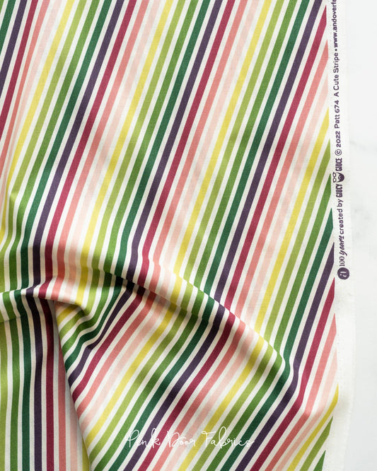 Cotton quilting fabric pattern called 'Stripe in Classica'. Part of the 'Natale' fabric collection. Designed by Giucy Giuce for fabric company Andover Fabrics. SKU: A-674-LR. 44-45 inch width.