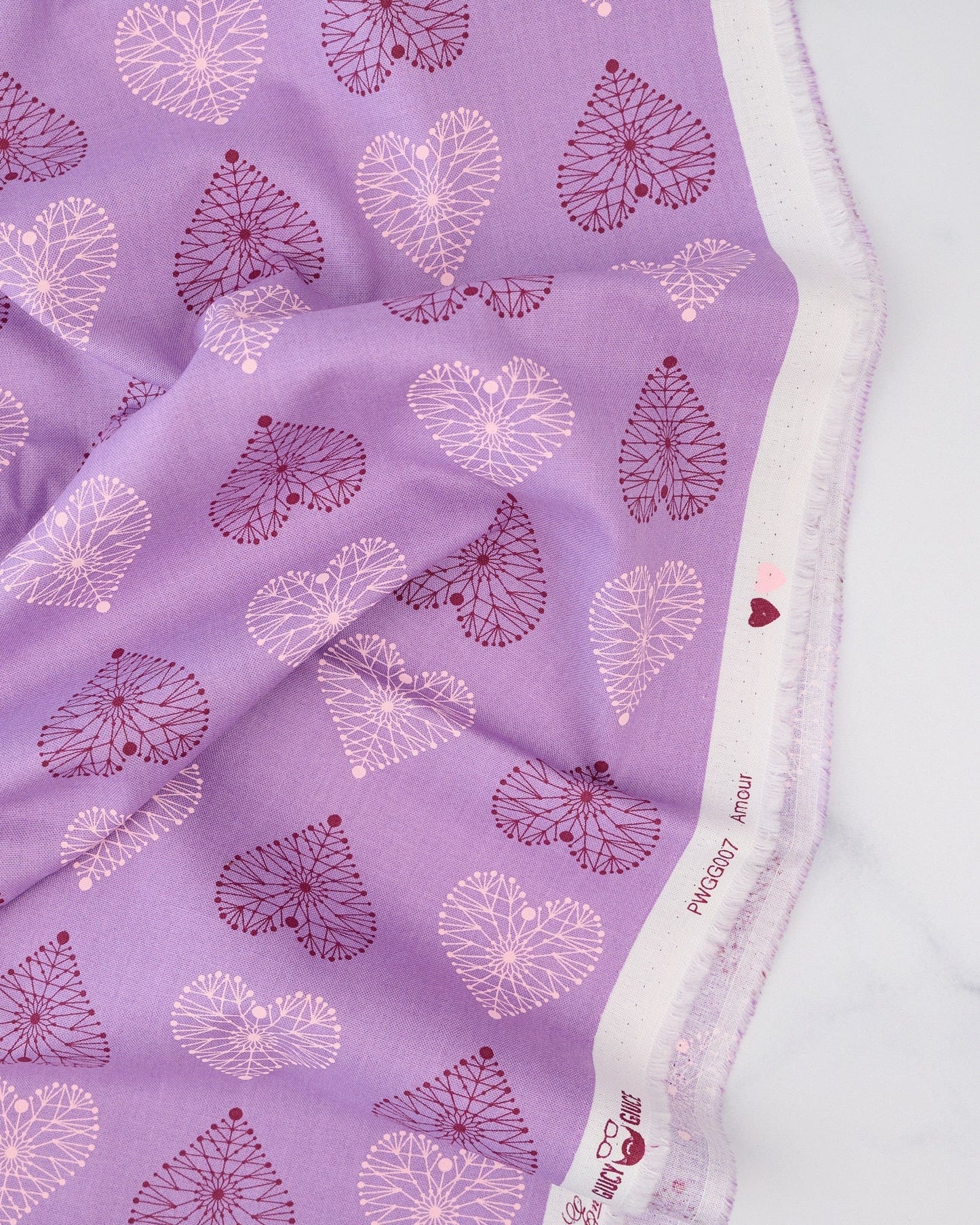 Amour in Amethyst quilting fabric, part of the Enrapture fabric collection by Giucy Giuce. (SKU: PWGG007.AMETHYST)