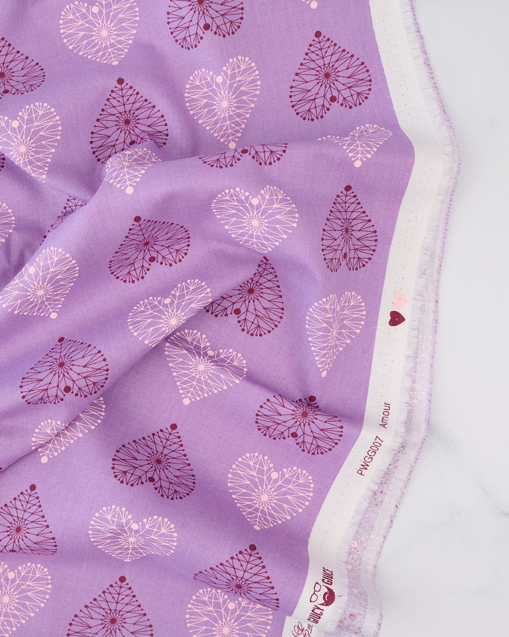 Amour in Amethyst quilting fabric, part of the Enrapture fabric collection by Giucy Giuce. (SKU: PWGG007.AMETHYST)