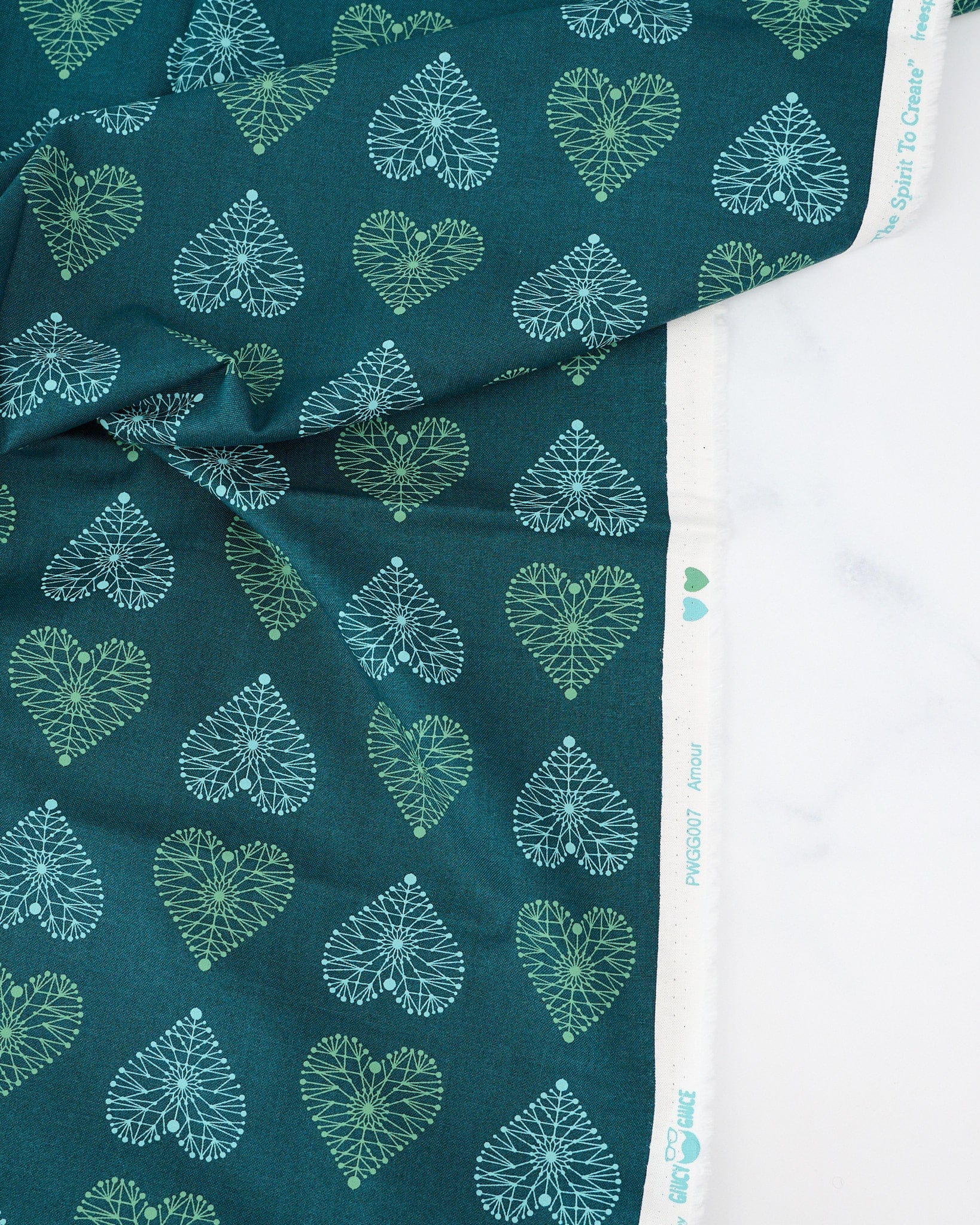 Amour in Turquoise quilting fabric, part of the Enrapture fabric collection by Giucy Giuce (SKU: PWGG007.TURQUOISE)