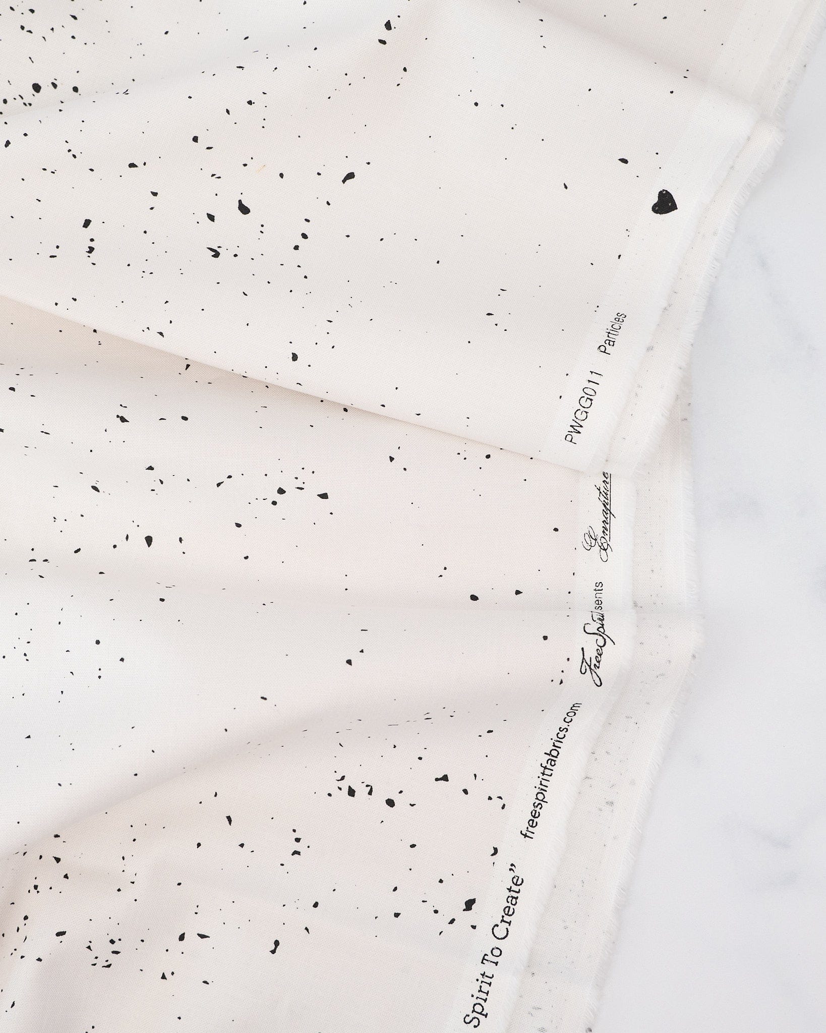 Particles in Ivory quilting fabric, part of the Enrapture fabric collection by Giucy Giuce (SKU: PWGG011.IVORY)