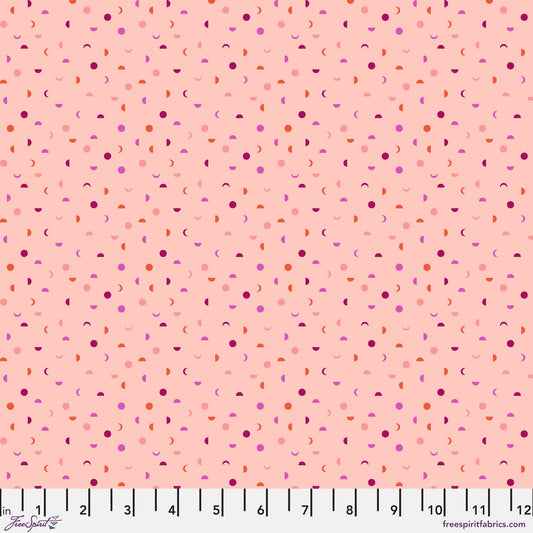 Cotton quilting fabric pattern called 'It's a Phase in Blush'. Part of the 'Mythical' fabric collection. Designed by Stacy Peterson for fabric company FreeSpirit Fabrics. SKU: PWST014.XBLUSH. 44-45 inch width.