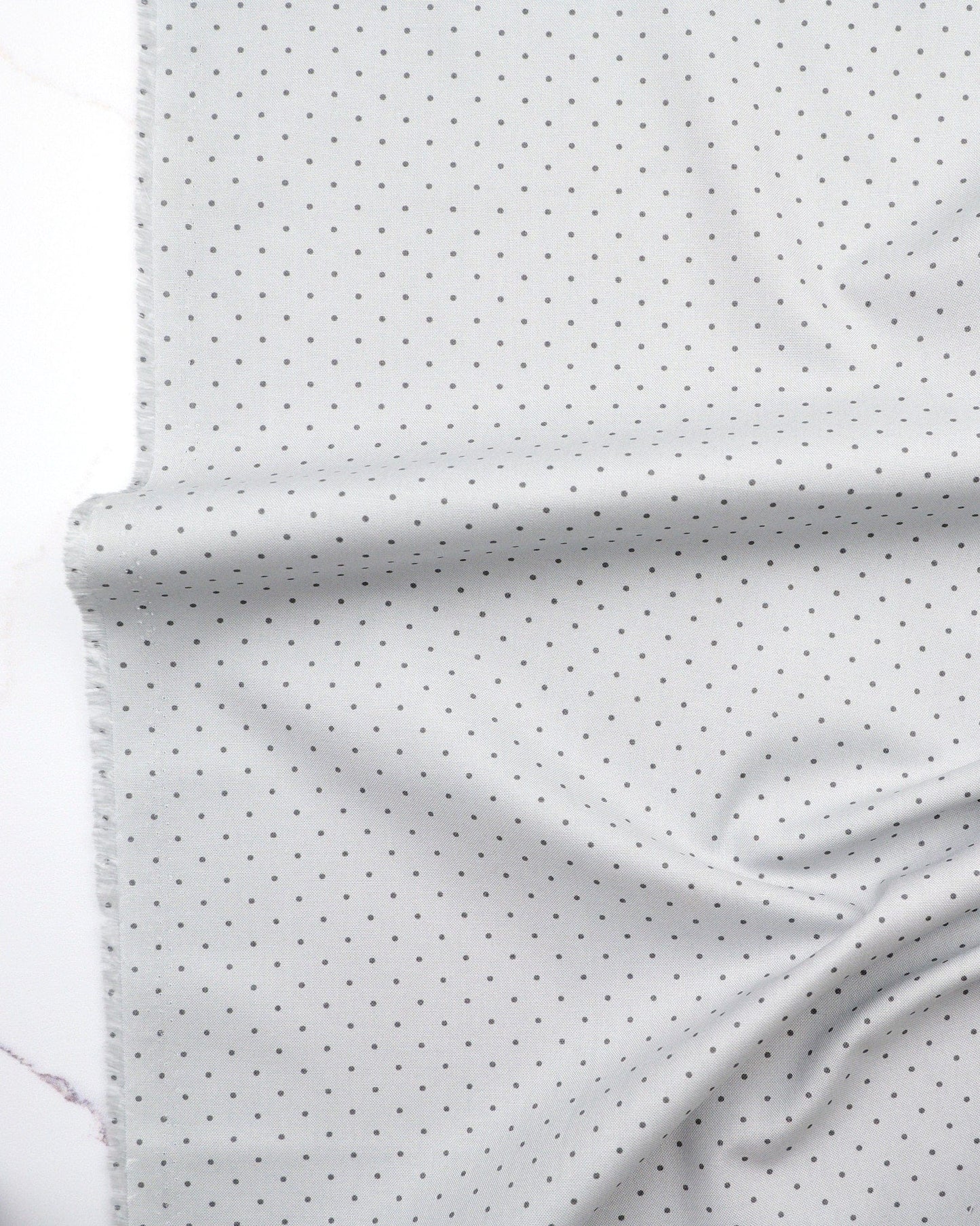 Tiny Dots in Fog quilting fabric, part of the Fall 2025 True Colors fabric collection by Tula Pink (SKU: PWTP185.FOG)