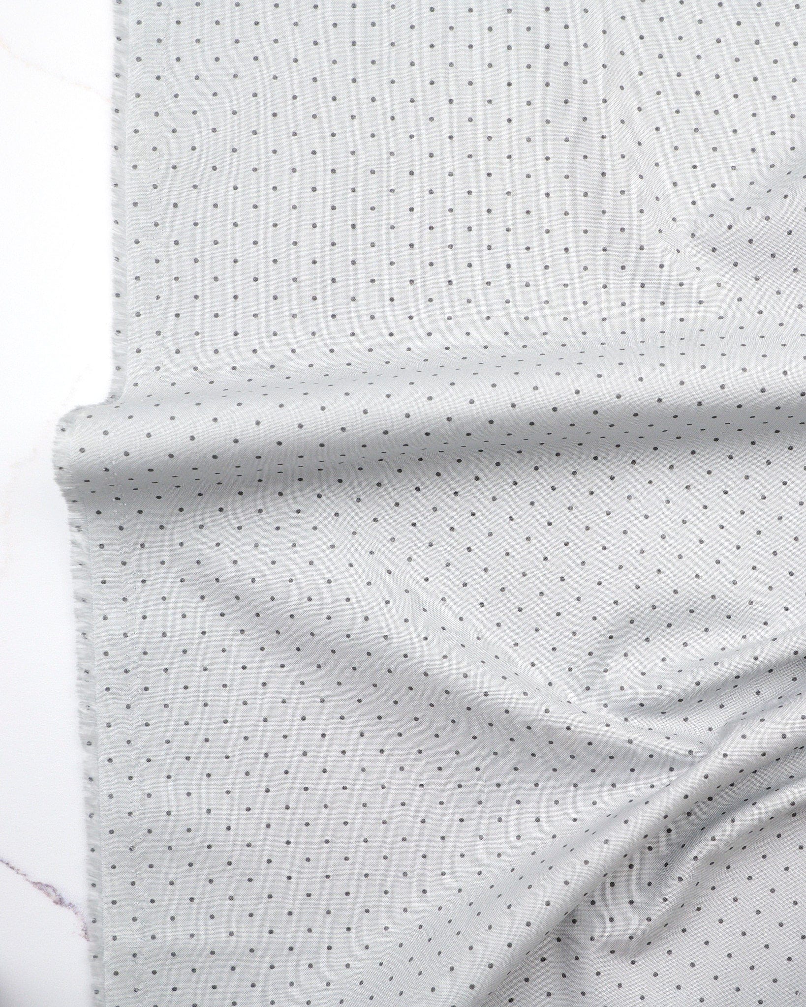 Tiny Dots in Fog quilting fabric, part of the Fall 2025 True Colors fabric collection by Tula Pink (SKU: PWTP185.FOG)