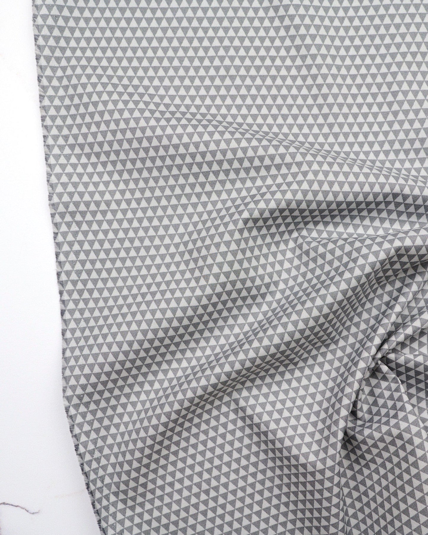 Kinda Shady in Fog quilting fabric, part of the Fall 2025 True Colors fabric collection by Tula Pink (SKU: PWTP263.FOG)