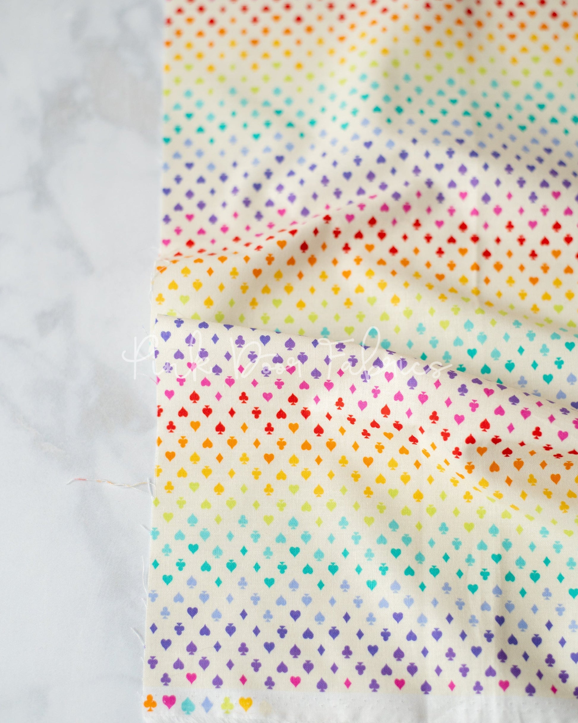 Cotton quilting fabric pattern called 'Suited and Booted in Wonder'. Part of the 'Curiouser & Curiouser' fabric collection. Designed by Tula Pink for fabric company Free Spirit Fabrics. SKU: PWTP168.WONDER. 44-45 inch width.