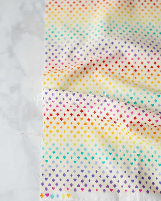 Cotton quilting fabric pattern called 'Suited and Booted in Wonder'. Part of the 'Curiouser & Curiouser' fabric collection. Designed by Tula Pink for fabric company Free Spirit Fabrics. SKU: PWTP168.WONDER. 44-45 inch width.
