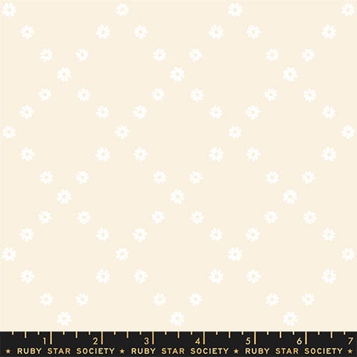 A closeup shot of the quilting fabric pattern called Diamond Flowers, designed by Melody Miller for Ruby Star Society, in the white on natural colorway. The SKU is RS0107 11.