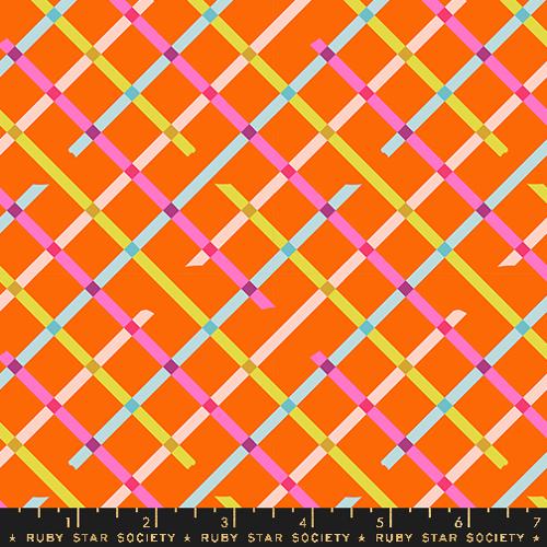 A closeup shot of the quilting fabric pattern called Off Grid, designed by Rashida Coleman Hale, in the goldfish colorway. The SKU is RS1104 14.