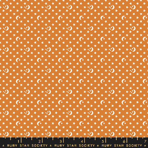 Cotton quilting fabric pattern called 'Moon and Stars in Caramel'. Part of the 'Ooh Lucky Lucky' fabric collection. Designed by Alexia Abegg for fabric company Ruby Star Society. SKU: RS4118 15. 44-45 inch width.