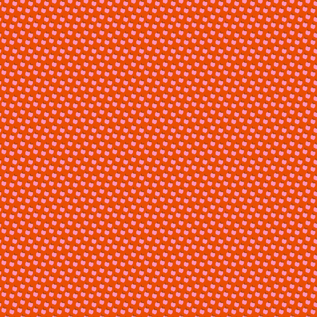 A closeup shot of the quilting fabric pattern called Apples, designed by Alexia Abegg for Ruby Star Society, in the warm red colorway. The SKU is RS4134 14.