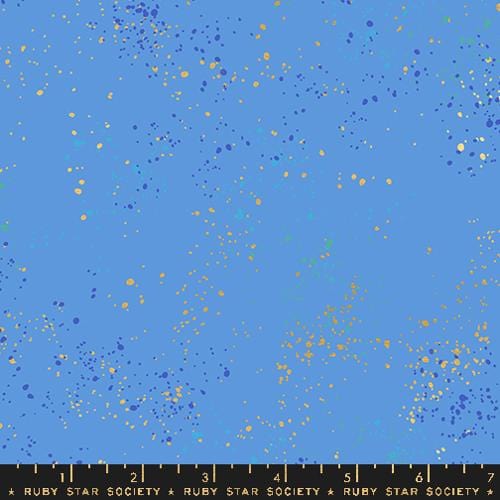 Cotton quilting fabric pattern called 'Lindley Blue'. Part of the 'Speckled Metallic' fabric collection. Designed by Rashida Coleman Hale for fabric company Ruby Star Society. SKU: RS5027 127M. 44-45 inch width.