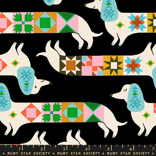 Quilty Dog in Soft Black quilting fabric, part of the 1 800 Notion fabric collection by Ruby Star Society (SKU: RS5213 13)
