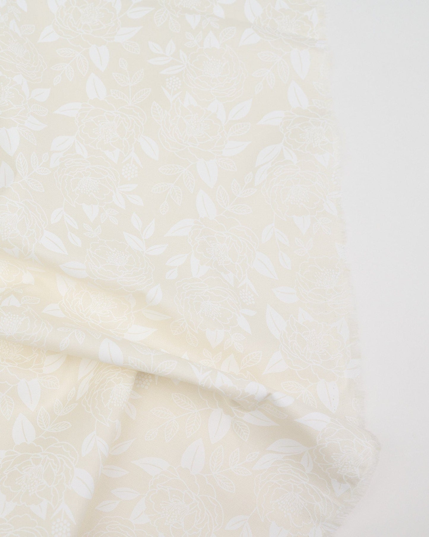 Cotton quilting fabric pattern called 'Garden Glow in Natural'. Part of the 'Rise and Shine' fabric collection. Designed by Melody Miller of Ruby Star Society for fabric company Moda Fabrics. SKU: RS0079 11. 44-45 inch width.
