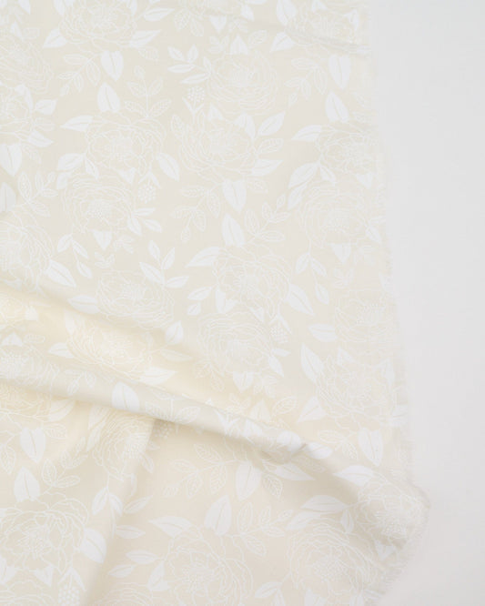 Cotton quilting fabric pattern called 'Garden Glow in Natural'. Part of the 'Rise and Shine' fabric collection. Designed by Melody Miller of Ruby Star Society for fabric company Moda Fabrics. SKU: RS0079 11. 44-45 inch width.