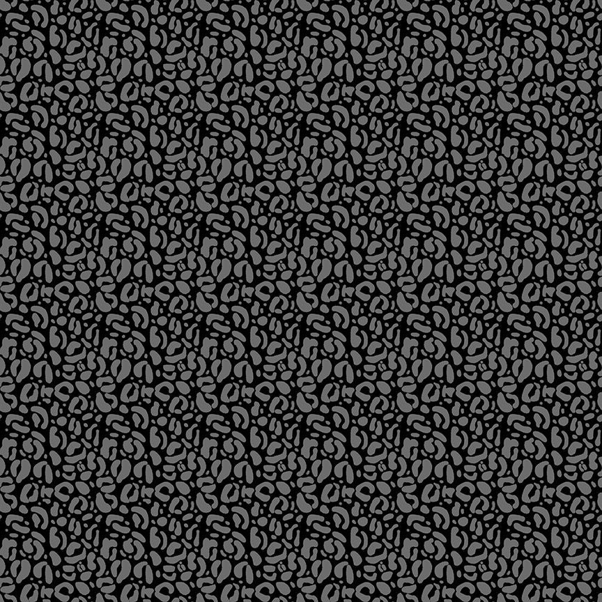 A closeup shot of the quilting fabric pattern called Wild, designed by Pammie Jane for Dear Stella, in the night colorway. The SKU is STELLA-DPJ3031 NIGHT.
