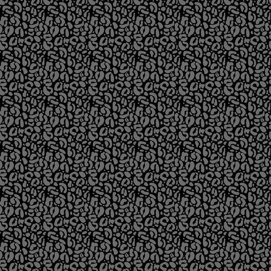 A closeup shot of the quilting fabric pattern called Wild, designed by Pammie Jane for Dear Stella, in the night colorway. The SKU is STELLA-DPJ3031 NIGHT.