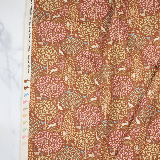 Cotton quilting fabric pattern called 'Sanctuary Caramel'. Part of the 'Sanctuary' fabric collection. Designed by Tone Finnanger for fabric company Tilda Fabrics. SKU: TIL100567. 44-45 inch width.