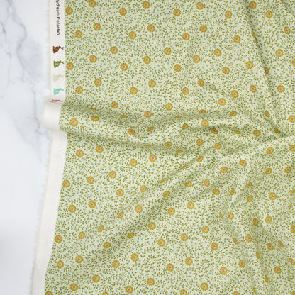 Cotton quilting fabric pattern called 'Daisydream Pistachio'. Part of the 'Sanctuary' fabric collection. Designed by Tone Finnanger for fabric company Tilda Fabrics. SKU: TIL100578. 44-45 inch width.