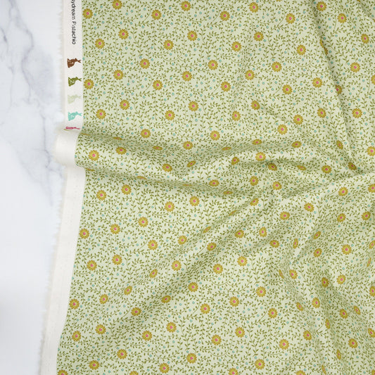 Cotton quilting fabric pattern called 'Daisydream Pistachio'. Part of the 'Sanctuary' fabric collection. Designed by Tone Finnanger for fabric company Tilda Fabrics. SKU: TIL100578. 44-45 inch width.
