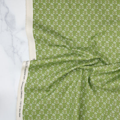 Cotton quilting fabric pattern called 'Mira Moss'. Part of the 'Sanctuary' fabric collection. Designed by Tone Finnanger for fabric company Tilda Fabrics. SKU: TIL110113. 44-45 inch width.