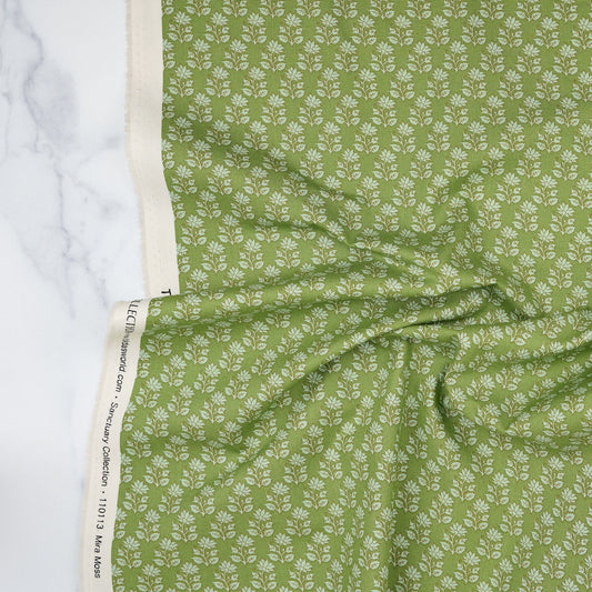 Cotton quilting fabric pattern called 'Mira Moss'. Part of the 'Sanctuary' fabric collection. Designed by Tone Finnanger for fabric company Tilda Fabrics. SKU: TIL110113. 44-45 inch width.