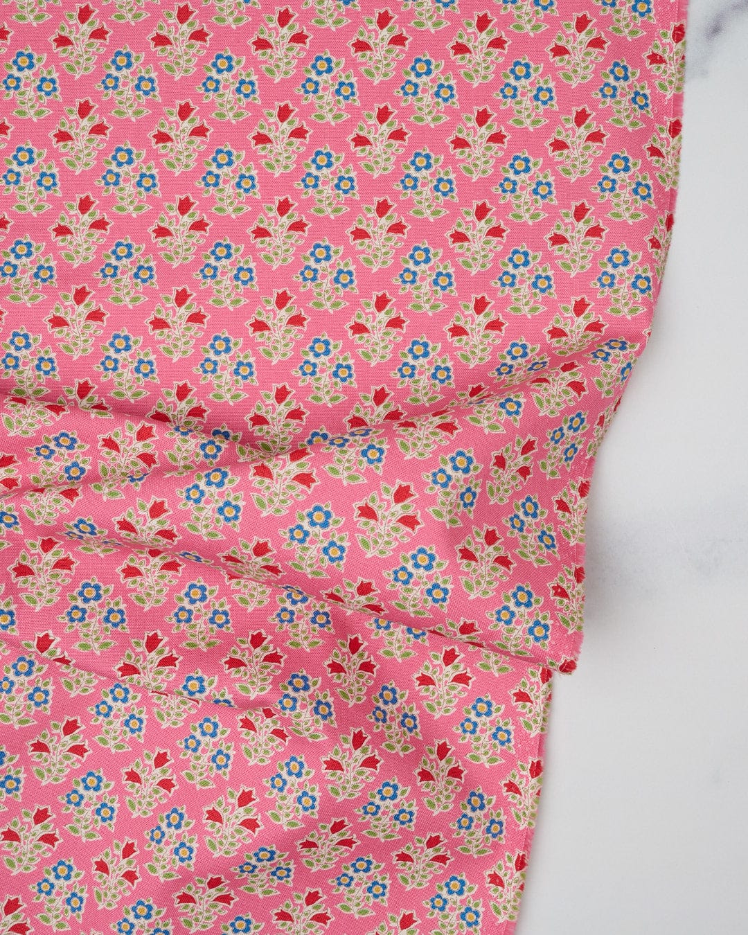Cotton quilting fabric pattern called 'Farm Flowers in Pink'. Part of the 'Jubilee' fabric collection. Designed by Tilda Fabrics for fabric company Tilda Fabrics. SKU: 110097. 44-45 inch width.