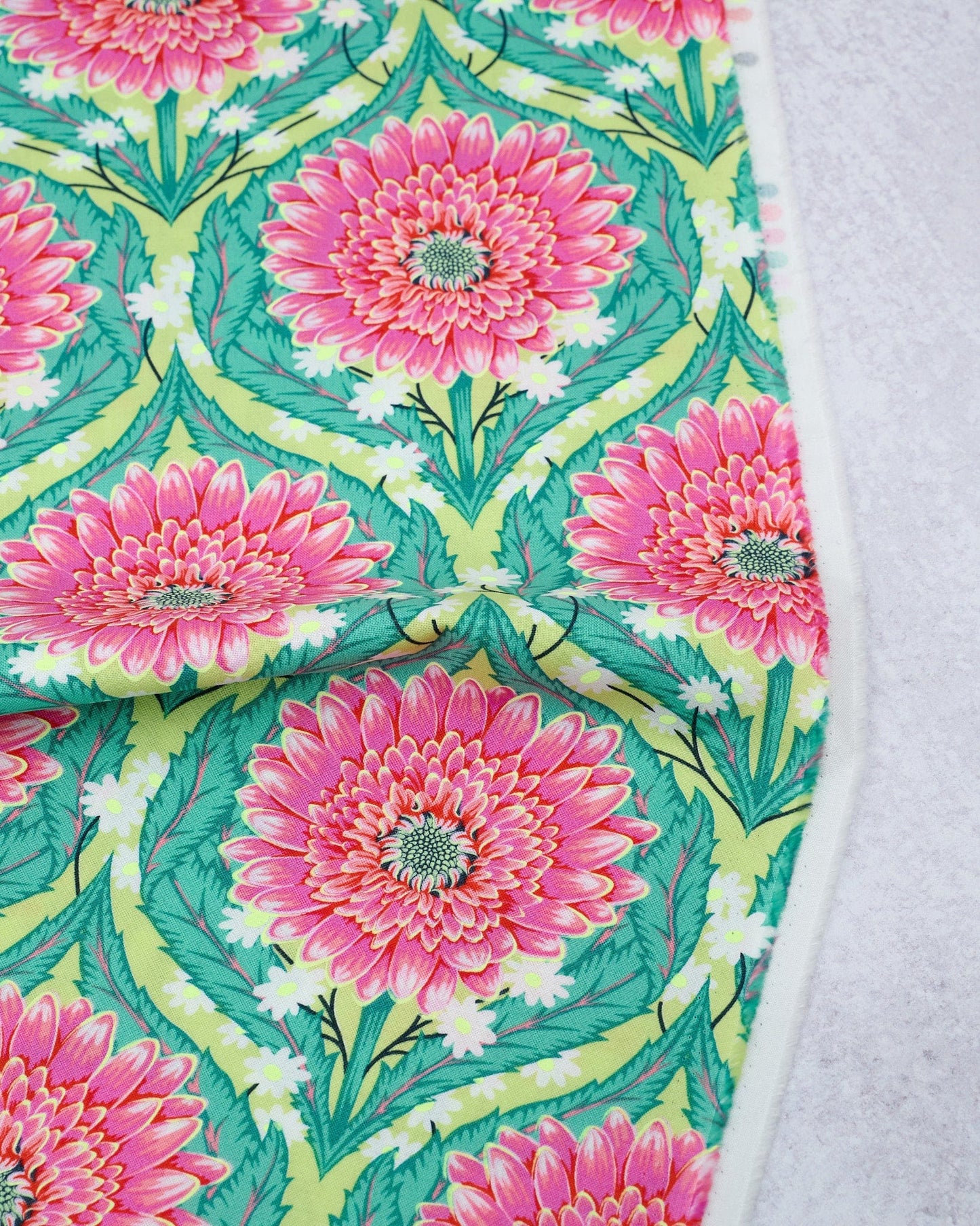 Cotton quilting fabric pattern called 'Daisy and Confused in Moonbeam'. Part of the 'Untamed' fabric collection. Designed by Tula Pink for fabric company Free Spirit Fabrics. SKU: PWTP236.MOONBEAM. 44-45 inch width.