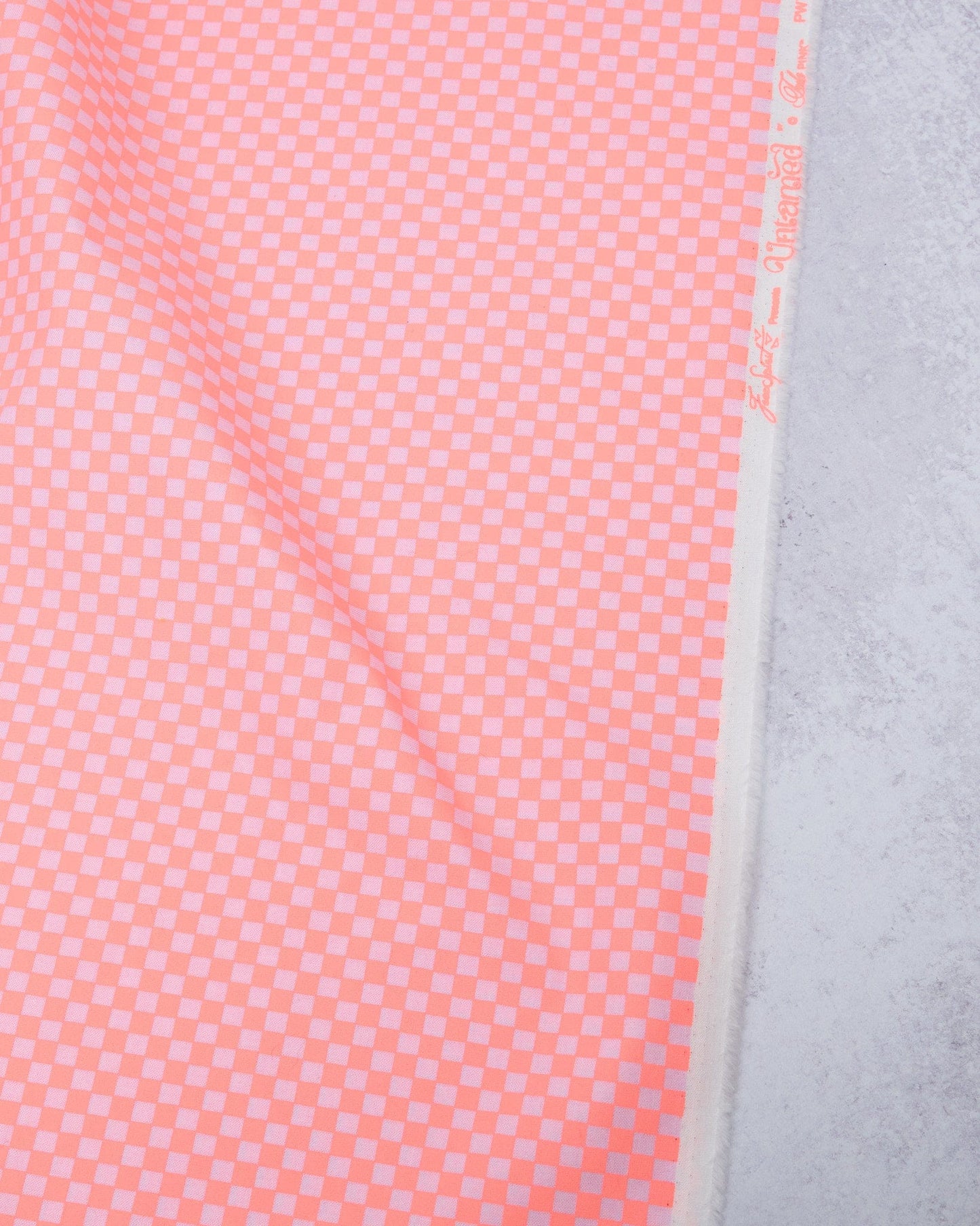 Cotton quilting fabric pattern called 'Check Please in Lunar'. Part of the 'Untamed' fabric collection. Designed by Tula Pink for fabric company Free Spirit Fabrics. SKU: PWTP242.LUNAR. 44-45 inch width.