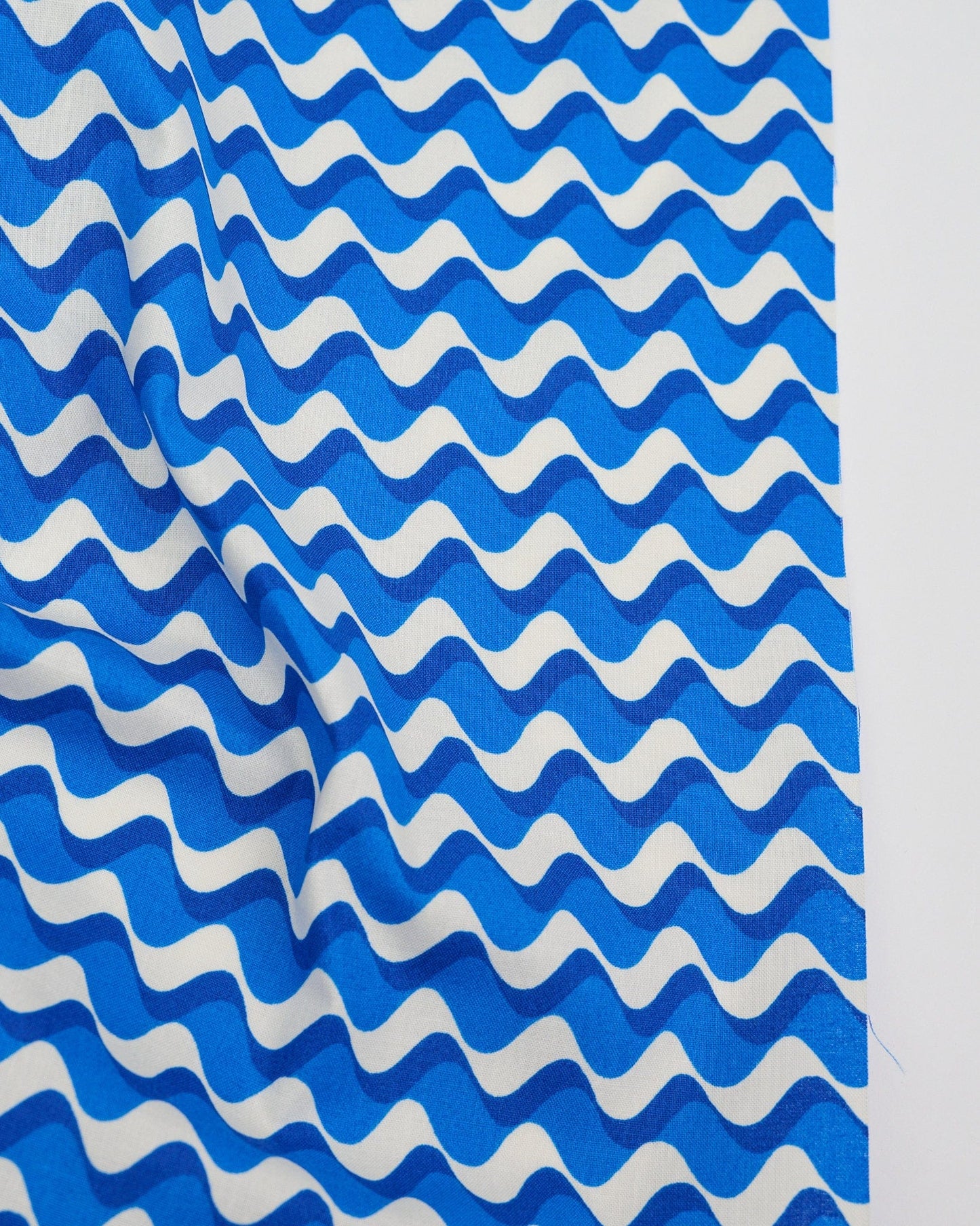 Cotton quilting fabric pattern called 'Water Ripple in Royal Blue'. Part of the 'Water' fabric collection. Designed by Ruby Star Society for fabric company Moda Fabrics. SKU: RS5128 12. 44-45 inch width.