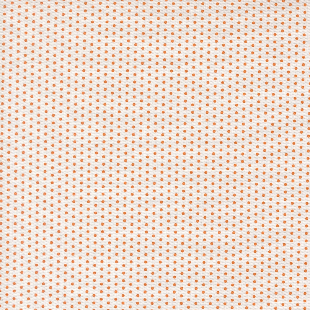 Moda's orange small polka dots on ivory Bonbon Jar by Jen Kingwell cotton quilting fabric.