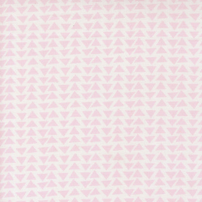 Pink geometric triangles on white allover cotton quilting fabric. Moda's Bonbon Jar by Jen Kingwell.