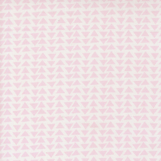 Pink geometric triangles on white allover cotton quilting fabric. Moda's Bonbon Jar by Jen Kingwell.