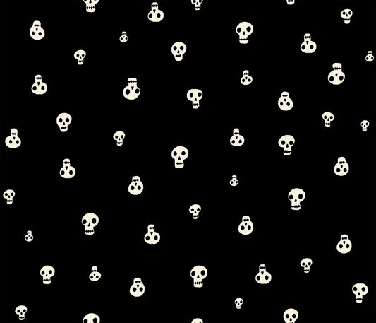 Moda's Halloween stylized cream skulls of varying sizes on black Boo Valley by Ruby Star Society's Alexia Abegg cotton quilting fabric