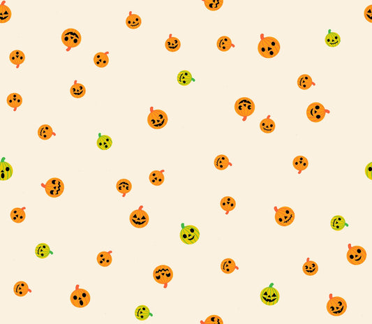 Halloween jack-o'-lanterns in bright orange, lime green, black on natural cream Boo Valley by Ruby Star Society's Alexia Abegg cotton quilting fabric.