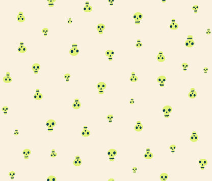 Halloween skulls in neon yellow with dark navy blue features on ivory cream. Boo Valley by Ruby Star Society's Alexia Abegg cotton quilting fabric.